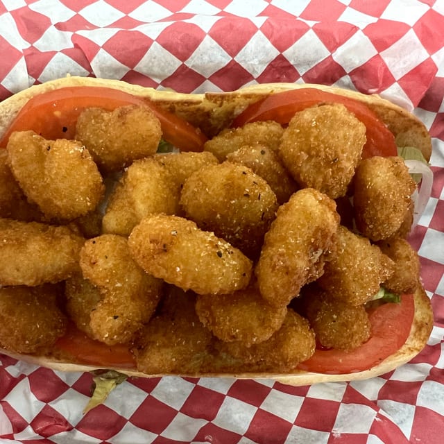 POPCORN SHRIMP PO BOY WITH FRIES.